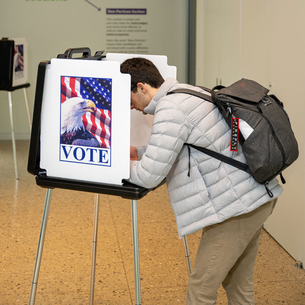 Photo of man voting