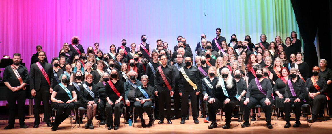 A photo of members of the Out Loud Chorus
