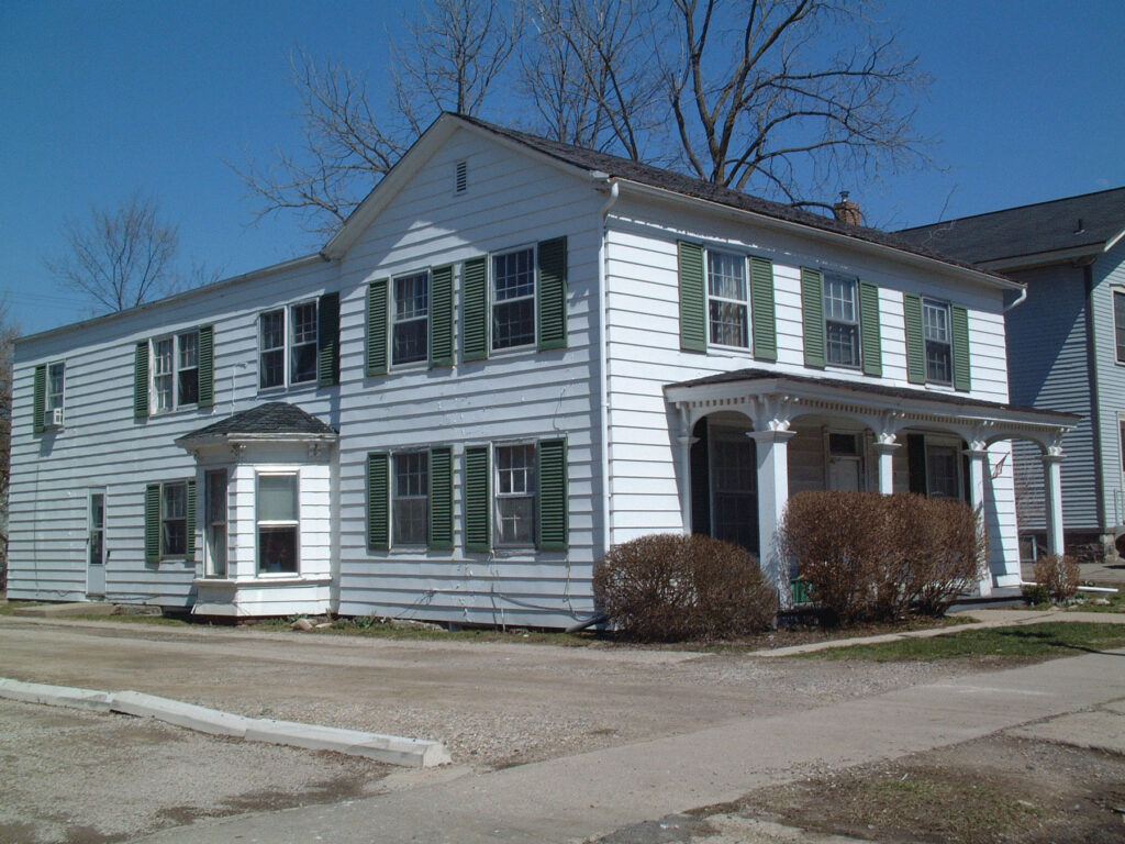 A photo of a house where U-M's first books might have been stored
