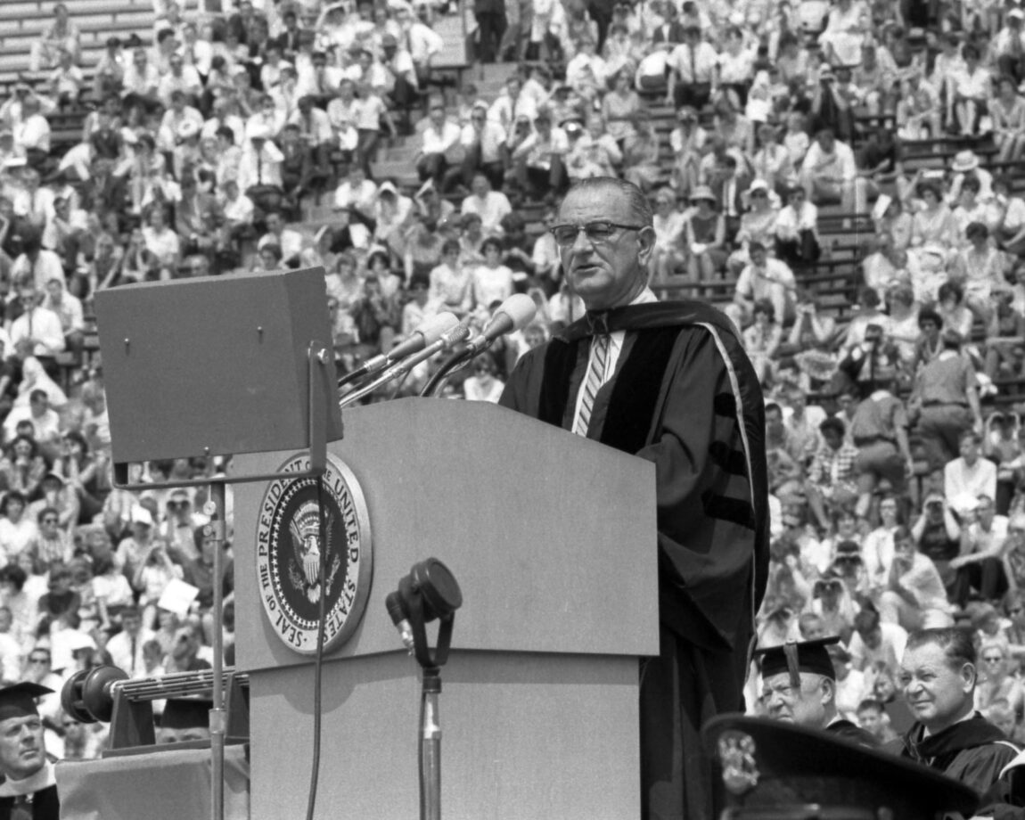 A photo of Lyndon Johnson addressing U-M graduates in 1964