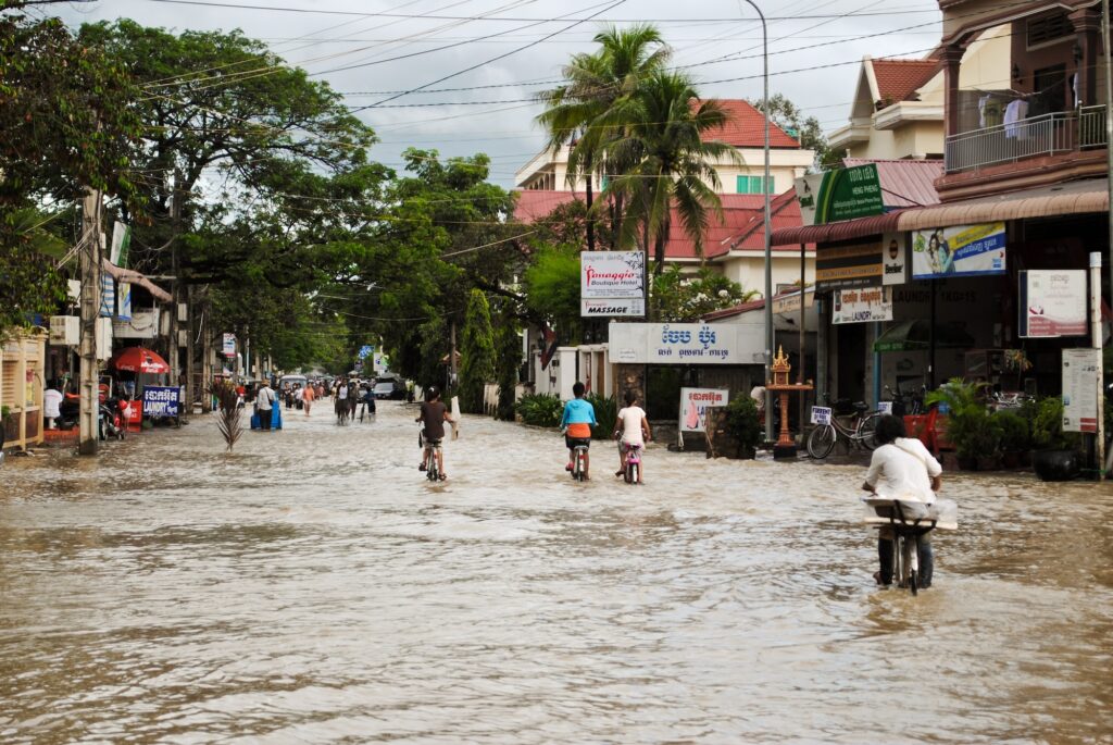 The daily life of the local people against flooding in the streets of Cambodia. Image credit: Aleksandra Novikova, iStock