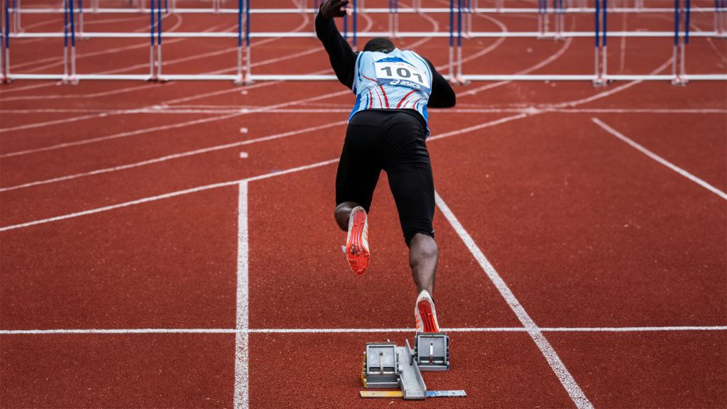 Athletic's on starting line during daytime. Image credit: Nicolas Hoizey, Unsplash