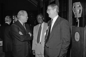 President Emeritus James J. Duderstadt (right) talks with former U.S. president and U-M alumnus Gerald R. Ford at a March 11, 2005, event.