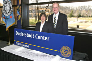 President Emeritus James J. Duderstadt and his wife, Anne, at the March 19, 2004, ceremony celebrating the naming of the James and Anne Duderstadt Center on North Campus.