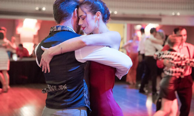 A photo of two people dancing