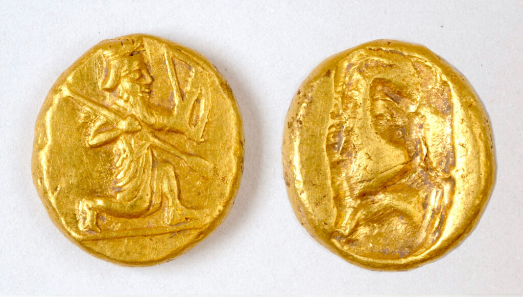 Archaeologists discovered a pot of gold Persian coins, called darics, at the ancient city of Notion in Turkey. The coins show a figure of a kneeling archer, the characteristic design of the Persian daric, a type of gold coin issued by the Persian Empire and probably minted at Sardis, 60 miles northeast of Notion, according to Christopher Ratté, a professor of ancient Mediterranean art and archaeology at the University of Michigan and director of the Notion Archaeological Project. Photo credit: Credit: Notion Archaeological Project, University of Michigan
