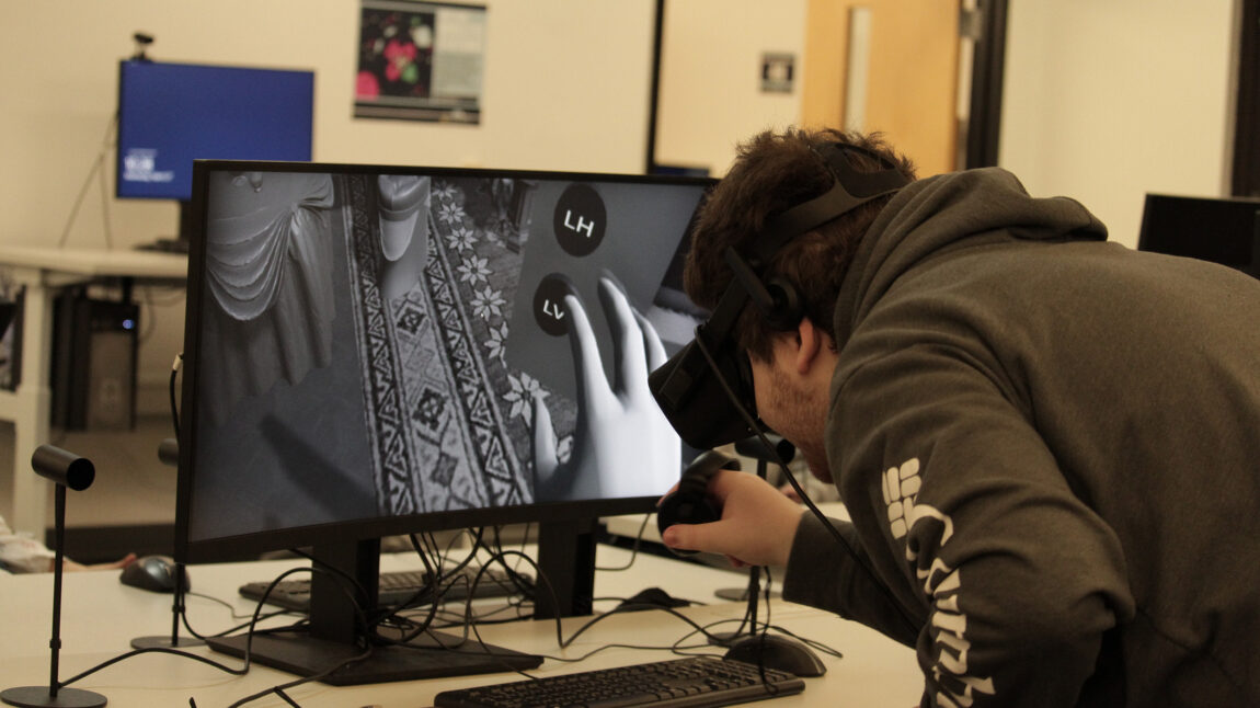 A photo of a student using virtual reality technology