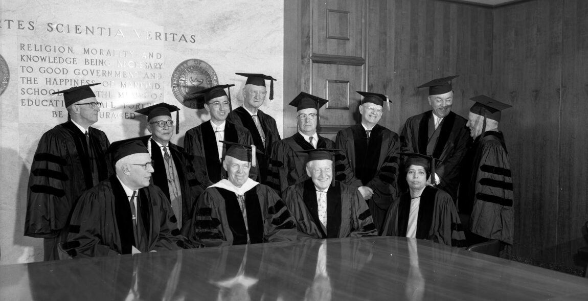 A photo of several people in caps and gowns