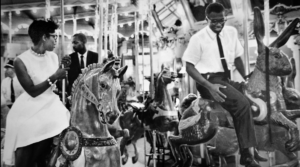 A Black woman and man ride the carousel at Glen Echo Amusement Park in 1960 in one of the nation's first civil rights protests.