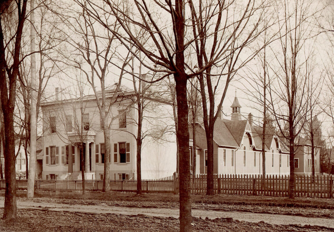 A photo of a building that housed the U-M Dental School and Homeopathic College in 1875.