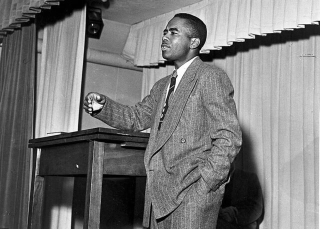 A photo of a man delivering a lecture