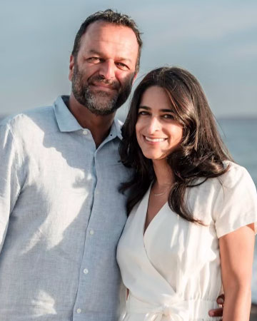 A photo of a man and a woman standing next to each other