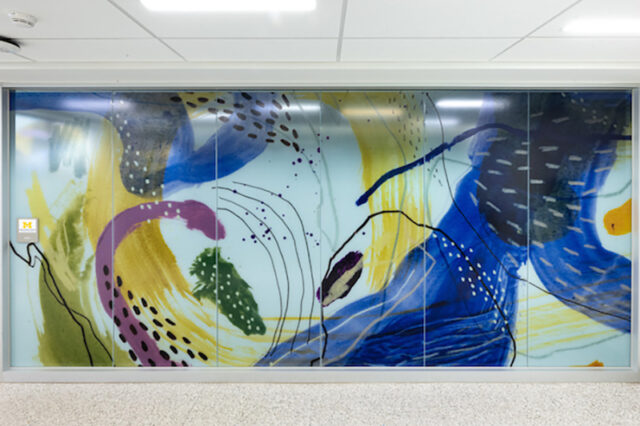 A photo of a mural depicting what a concussion is like