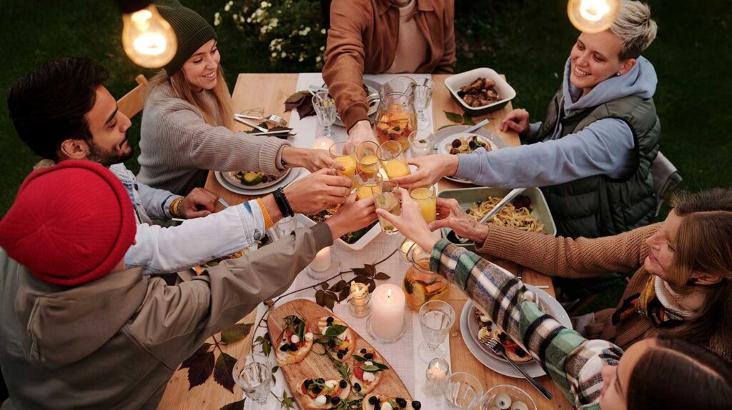 A family sharing a Thanksgiving toast. Image credit: Askar Abayev, Pexels.com