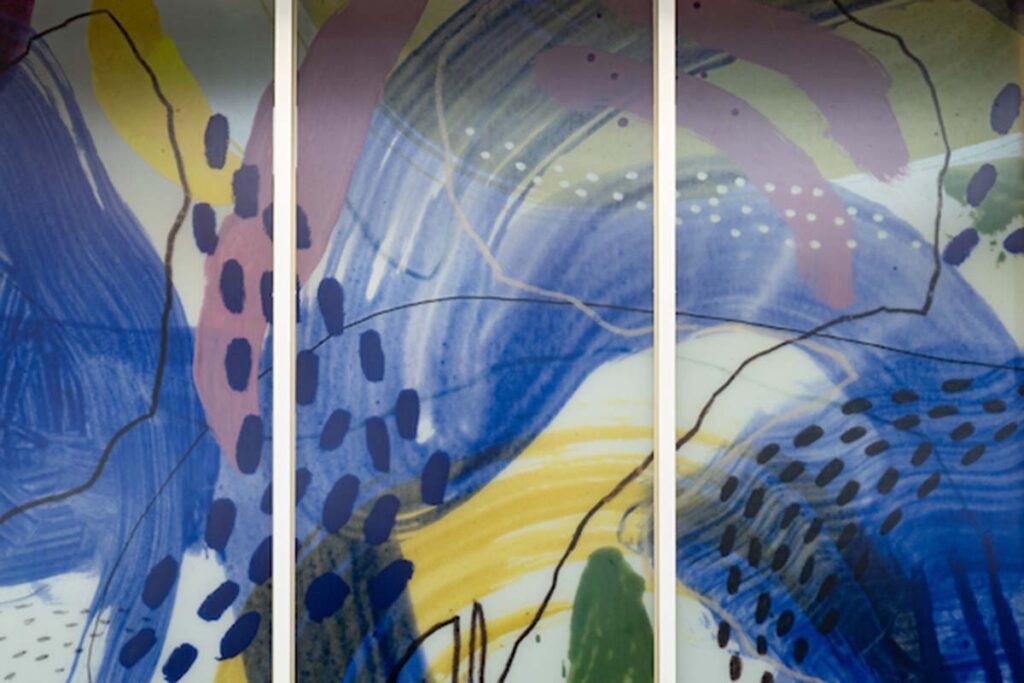 Photo of the U-M Concussion Center mural by Ypsilanti, Michigan-based artist Avery Williamson.
