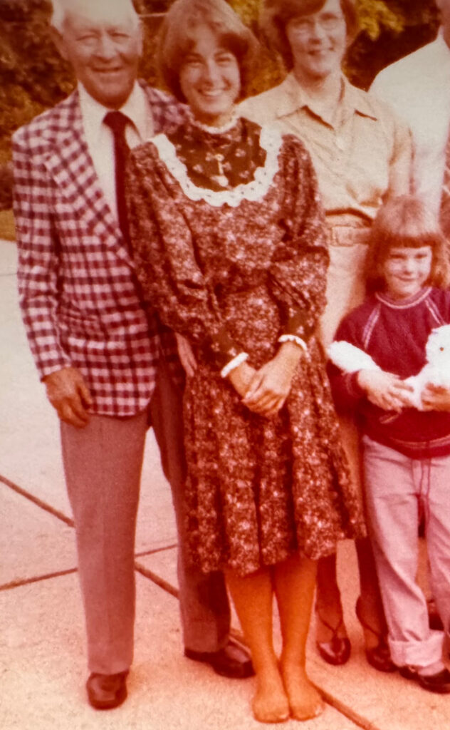 A photo from 1978 of four family members, a grandfather, mother and two daughters