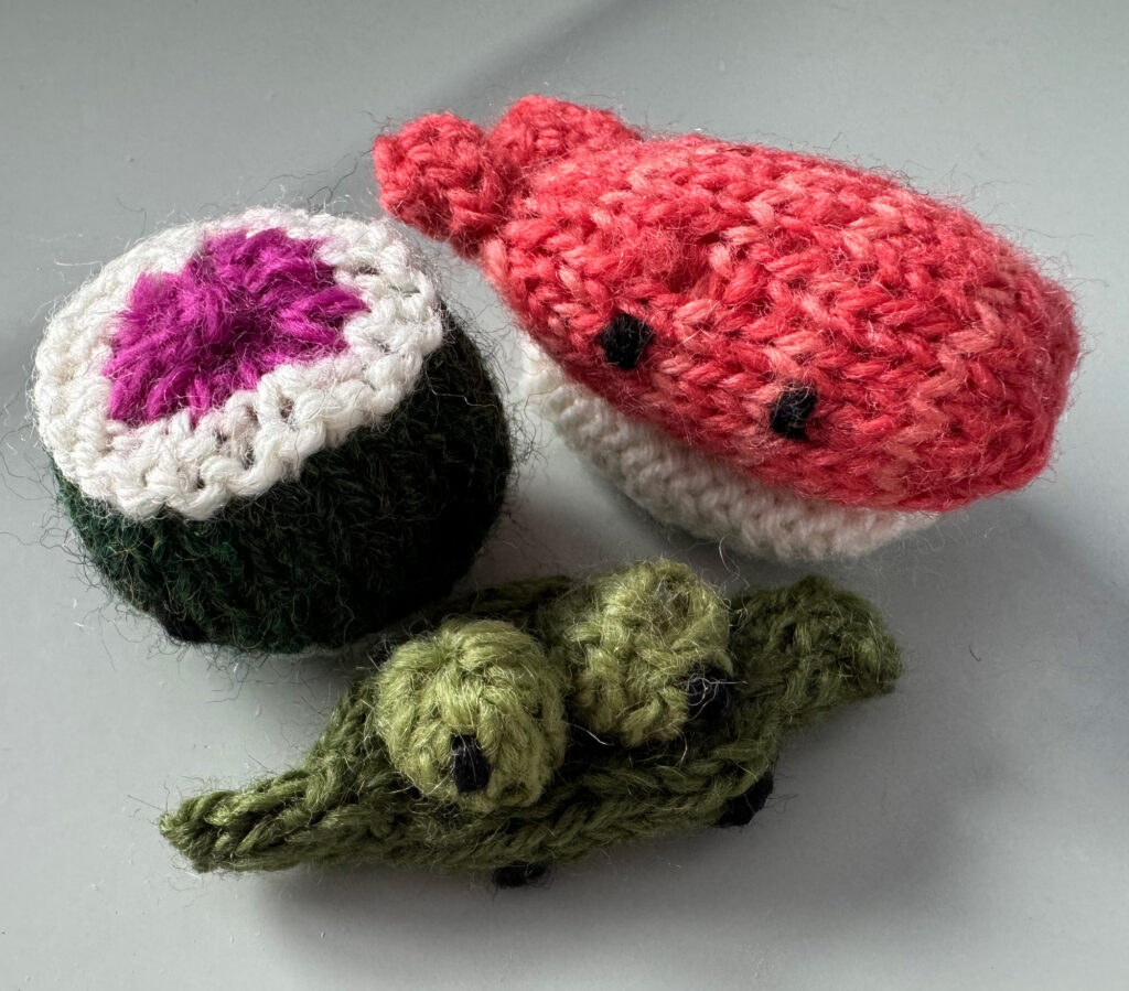A photo of knitted "amigurumi" creations.