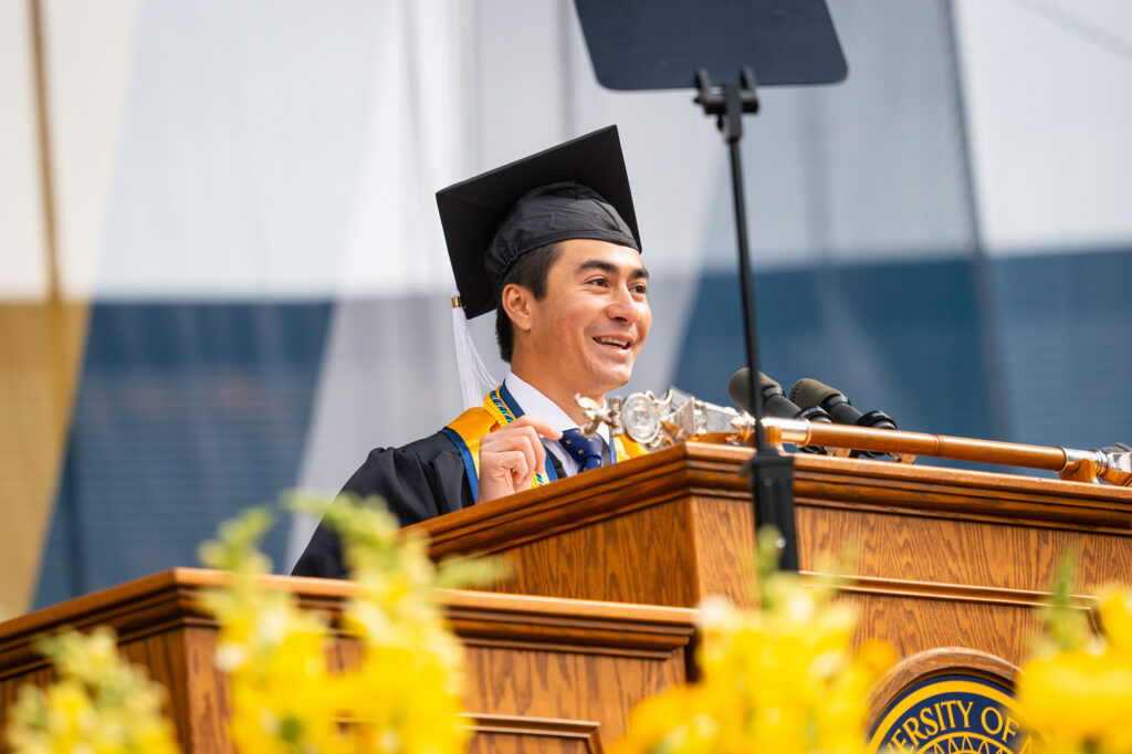 A man standing at a podium addressing a crowd
