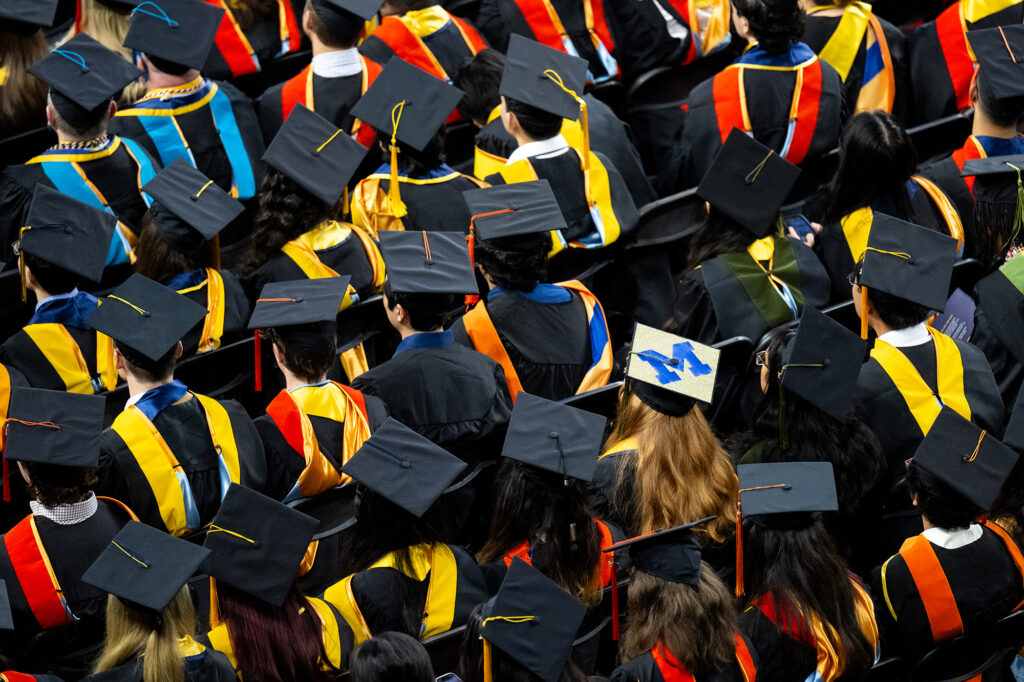 Students attending a graduation.