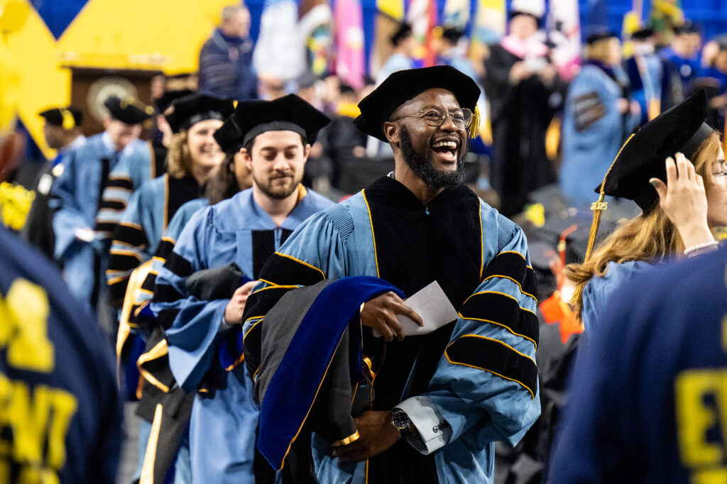 Student celebrates at graduation.