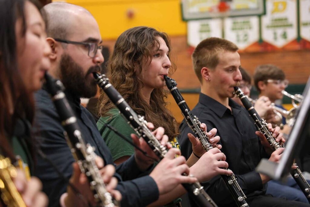 Alora Rishko, a junior at H. H. Dow High School, center, said performing with the U-M Symphony Band was "a once-in-a-lifetime opportunity to perform with the U of M band as a high schooler."
