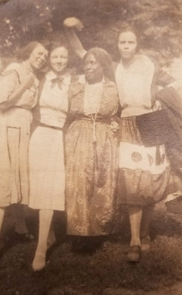 Esther Dickson with students in the late 1930s