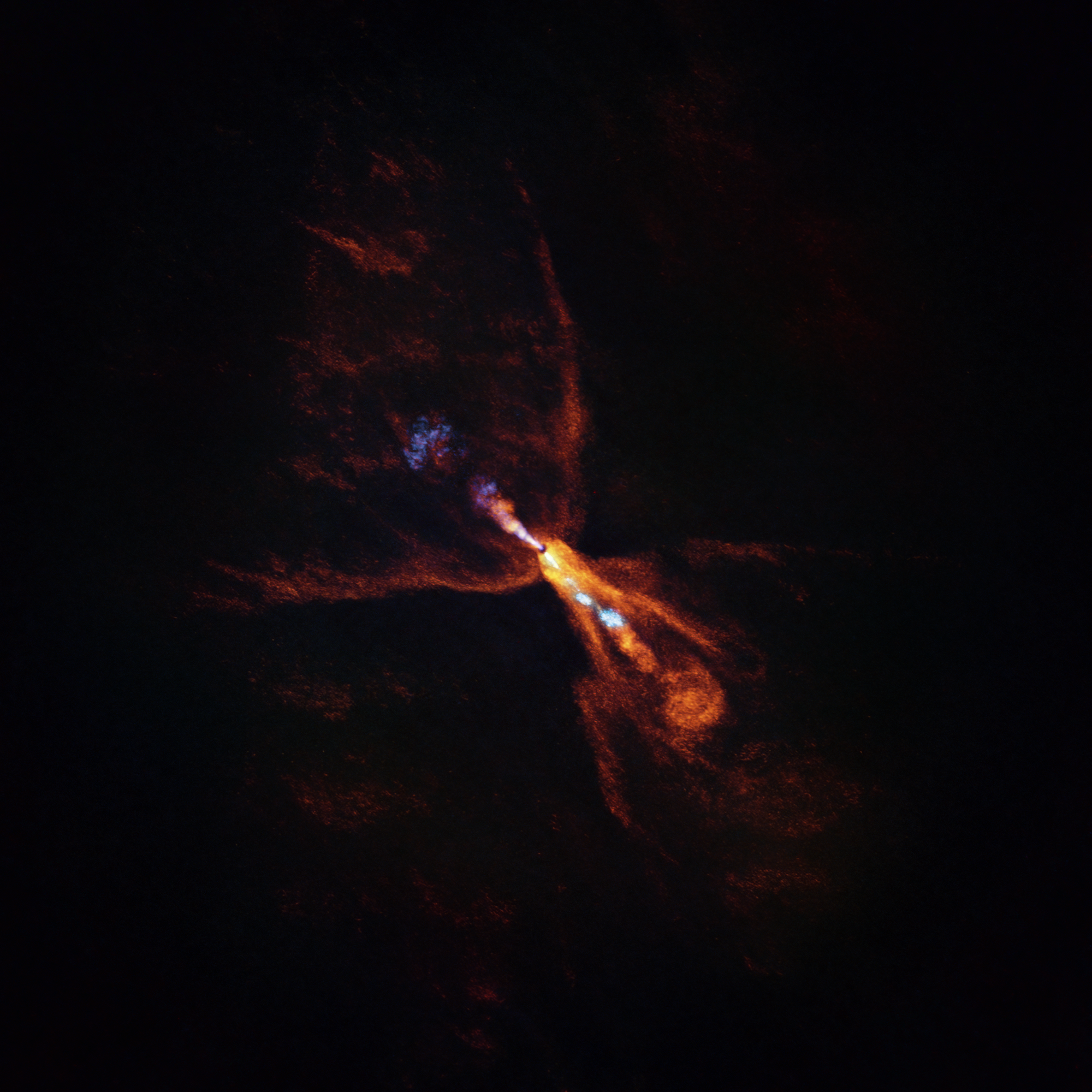 In an image taken with the ALMA Observatory and the JWST space telescope, carbon monoxide, seen as a diffuse orange cloud, is blowing away from the star in a butterfly-shaped wind. In blue, a narrow jet of silicon monoxide is beaming away from the star. These gaseous winds and jets are common around baby stars like HOPS-315.
Together the ALMA and JWST observations indicate that, in addition to these features, there is also a disc of gaseous silicon monoxide around the star that is condensing into solid silicates––the first stages of planetary formation.