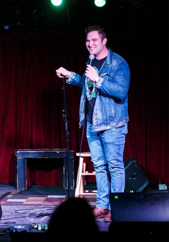 JT Godfrey doing standup at a club in Cleveland.