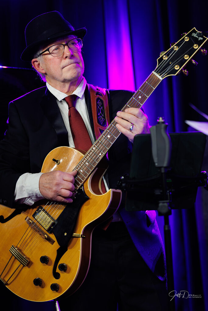 Stephen Ragsdale playing guitar at Blue Llama.