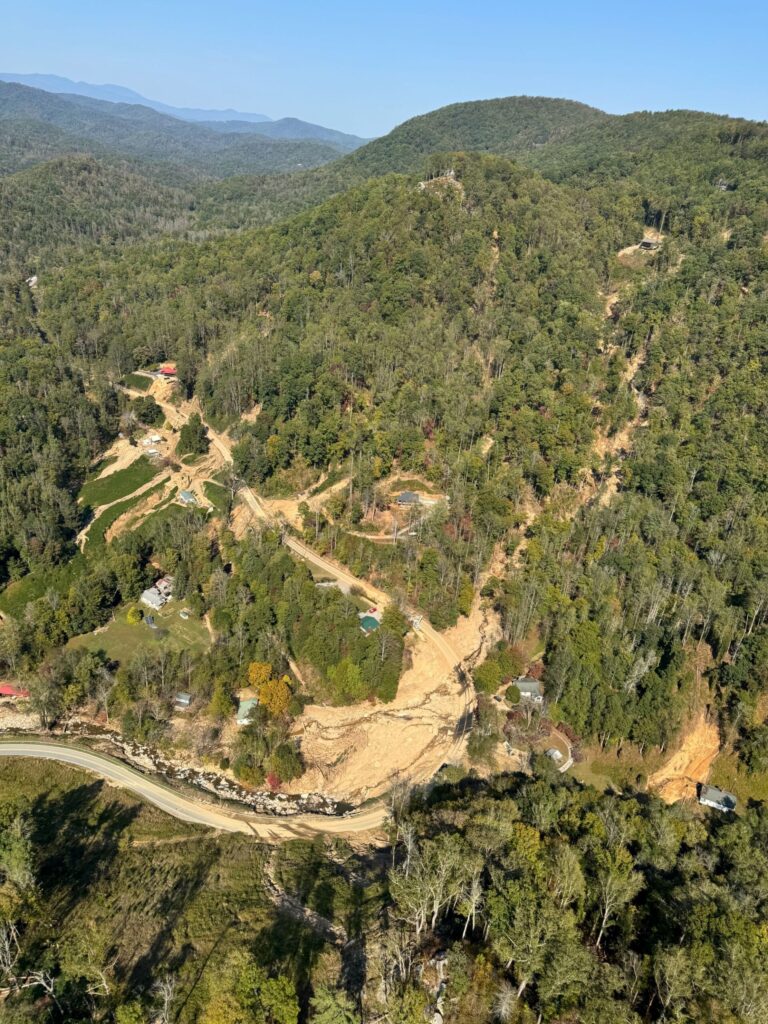 During the 2024 Hurricane Helene, multiple landslides and mudflows deposited sediment in adjacent rivers near Bat Cave, N.C. Adding these large volumes of mud and rock to rivers fills up the channel and will increase flooding hazard for years to come. Image credit: Kate Allstadt, U.S. Geological Survey