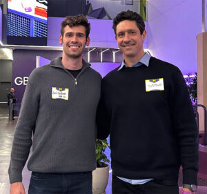 Two University of Michigan graduates representing U-M in Sao Paulo.