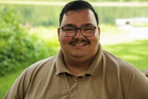 Ricco Ruiz, bereavement coordinator for the hospice team at Wellspring Lutheran Services and Camp Hope director. Image credit: Jeremy Marble, University of Michigan News