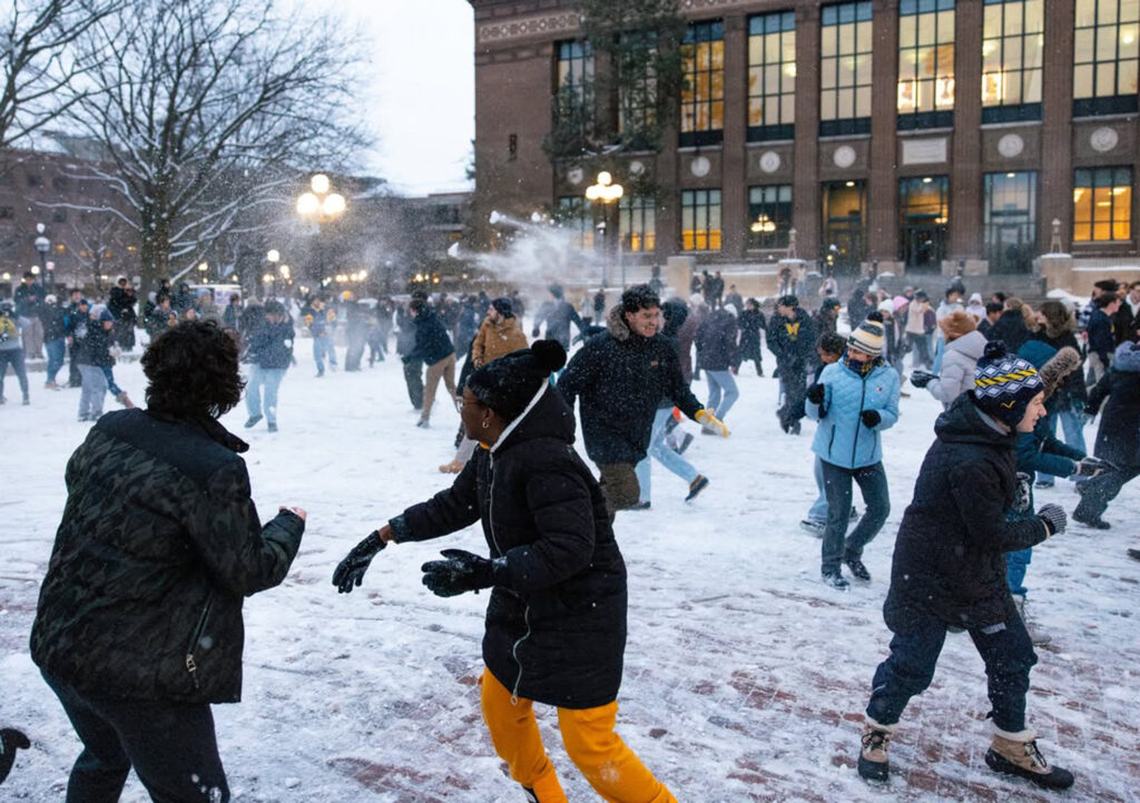Students have a snowball fight on the Diag in February 2025.
