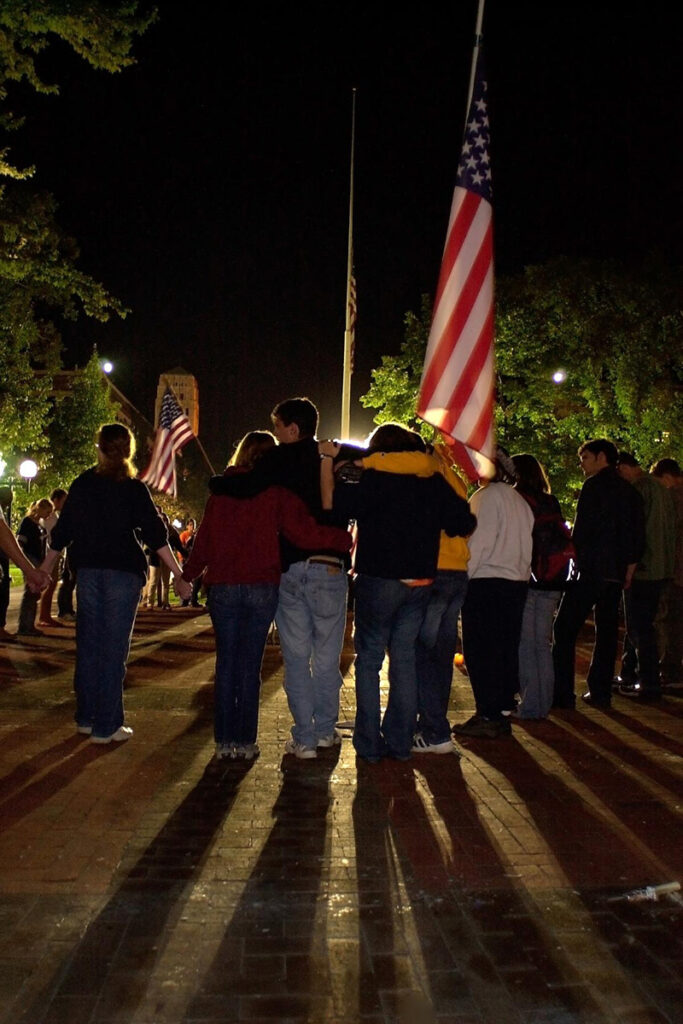 Members of the U-M community gather on the Diag in a vigil after the terrorist attacks on Sept. 11, 2001.