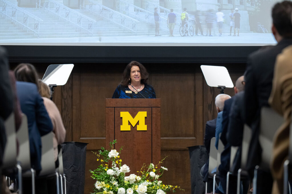 Woman at podium