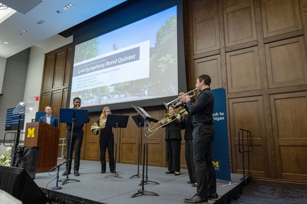 Student musicians playing on stage