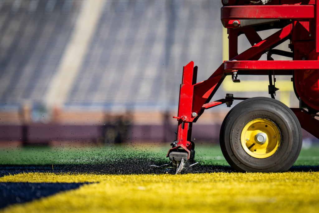 A grooming tool used for the artificial turf at a stadium