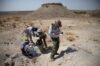 Haile-Selassie and his crew documenting and collecting fossils at one of the Woranso-Mille localities. Image credit: Dale Omori