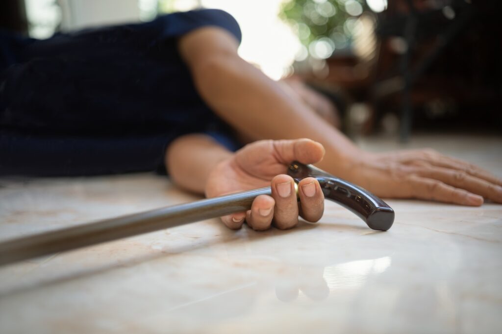 Senior man falling down at home because stumbled on a door kerb. Image credit: toa555, Adobe Stock