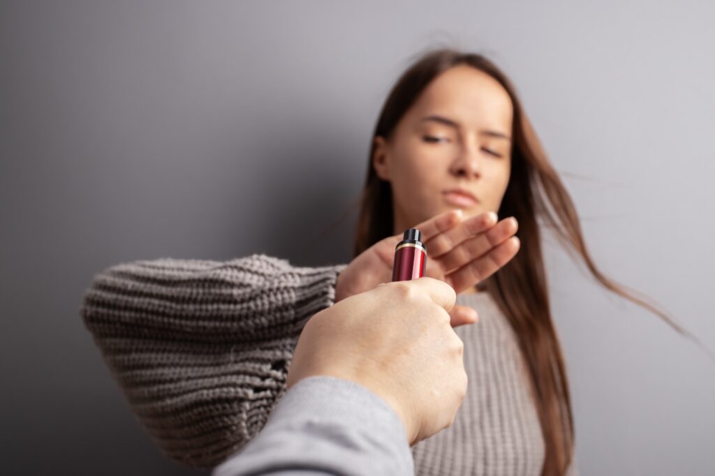 Teenager refusing a vape pen. Image credit: Adobe Stock