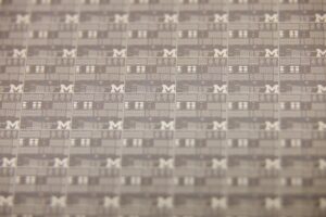 A close-up look at the solar cell devices defined on a silicon wafer with a thin aluminum layer with dimensions as small as 1 micrometer, about 1/100 of a human hair. Image credit: Jeremy Marble, Michigan News