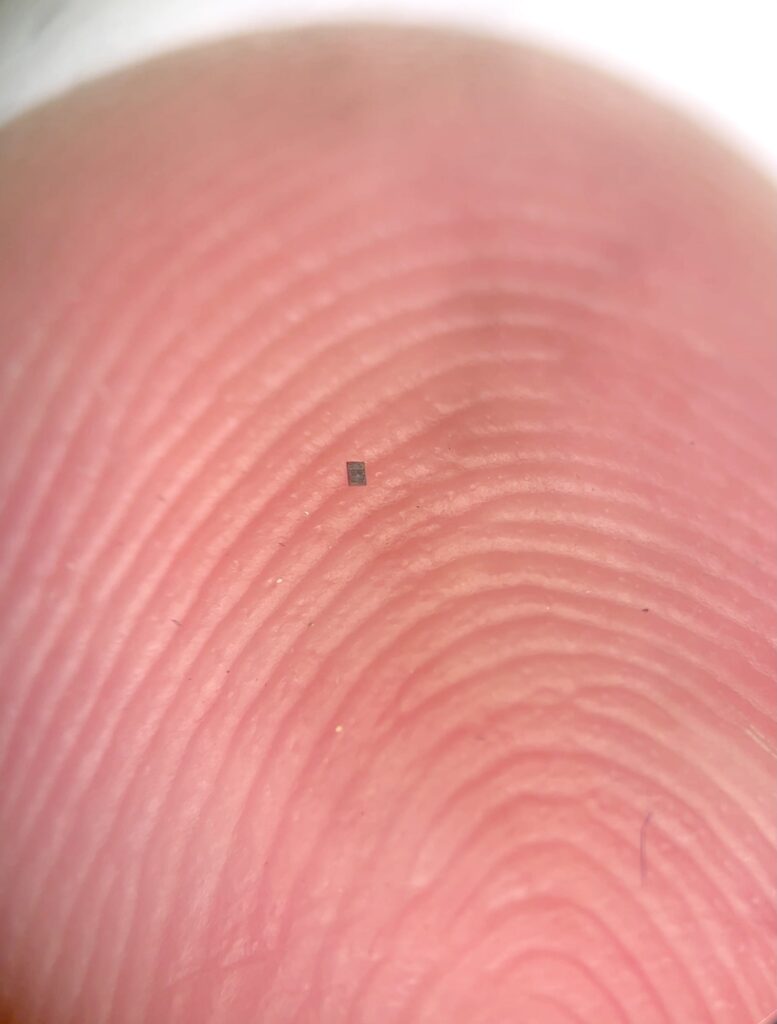 The robot, shown on a fingertip for scale. Image credit: Marc Miskin, University of Pennsylvania